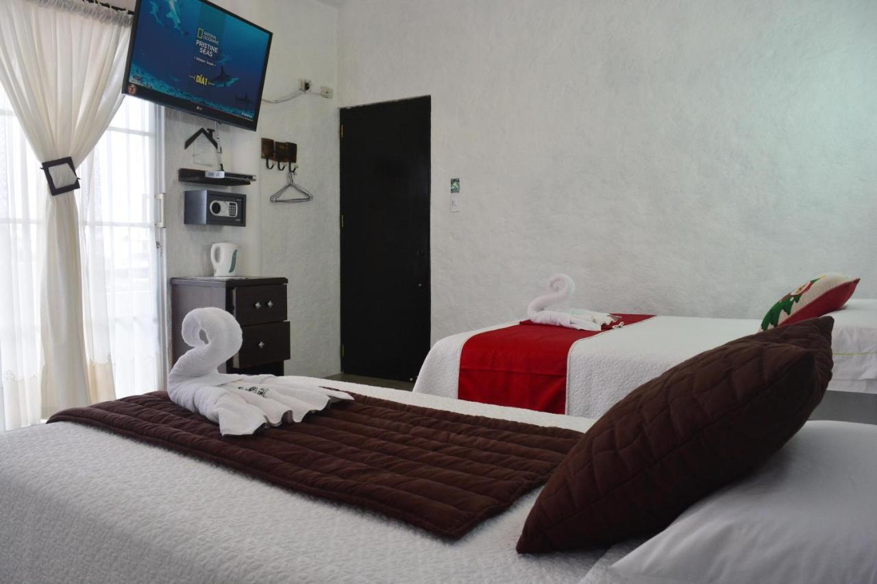 Hostal Cann'S House Puerto Baquerizo Moreno Exterior foto